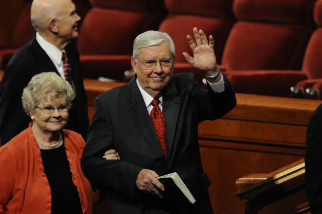 M. Russell Ballard and Barbara Bowen Ballard walk off the stand at the October 2010 General Conference.