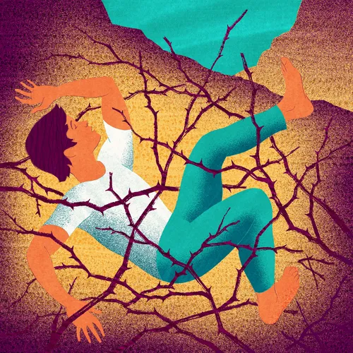 young man in thorn bush