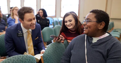 Missionaries converse with investigators in Louisville, Kentucky.