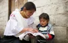 woman reading to child