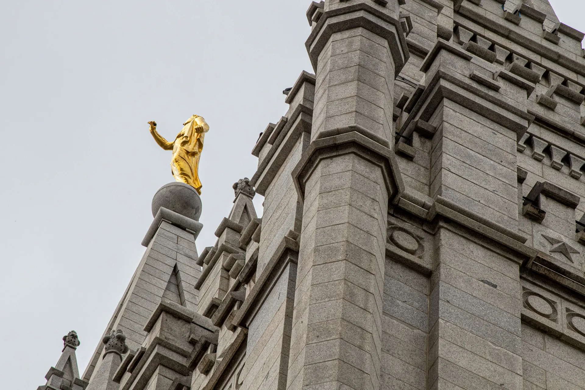 Images of the renovation during the Salt Lake Utah Temple renovation project. The images show some of the exterior damage from the earthquakes. 