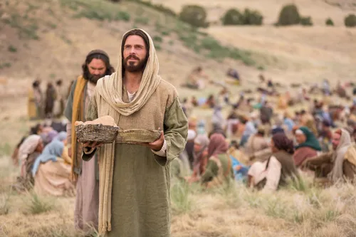 Bible video depiction of Jesus blessing bread