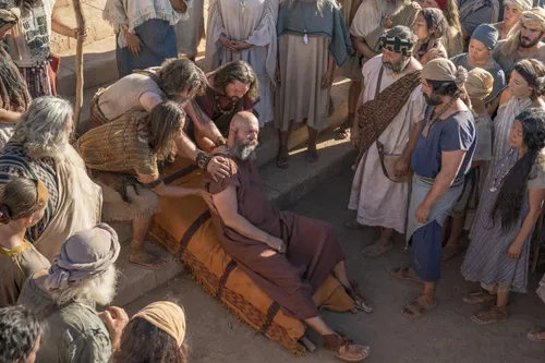 Nephites carry Sherem after he was struck down as a sign from God.
