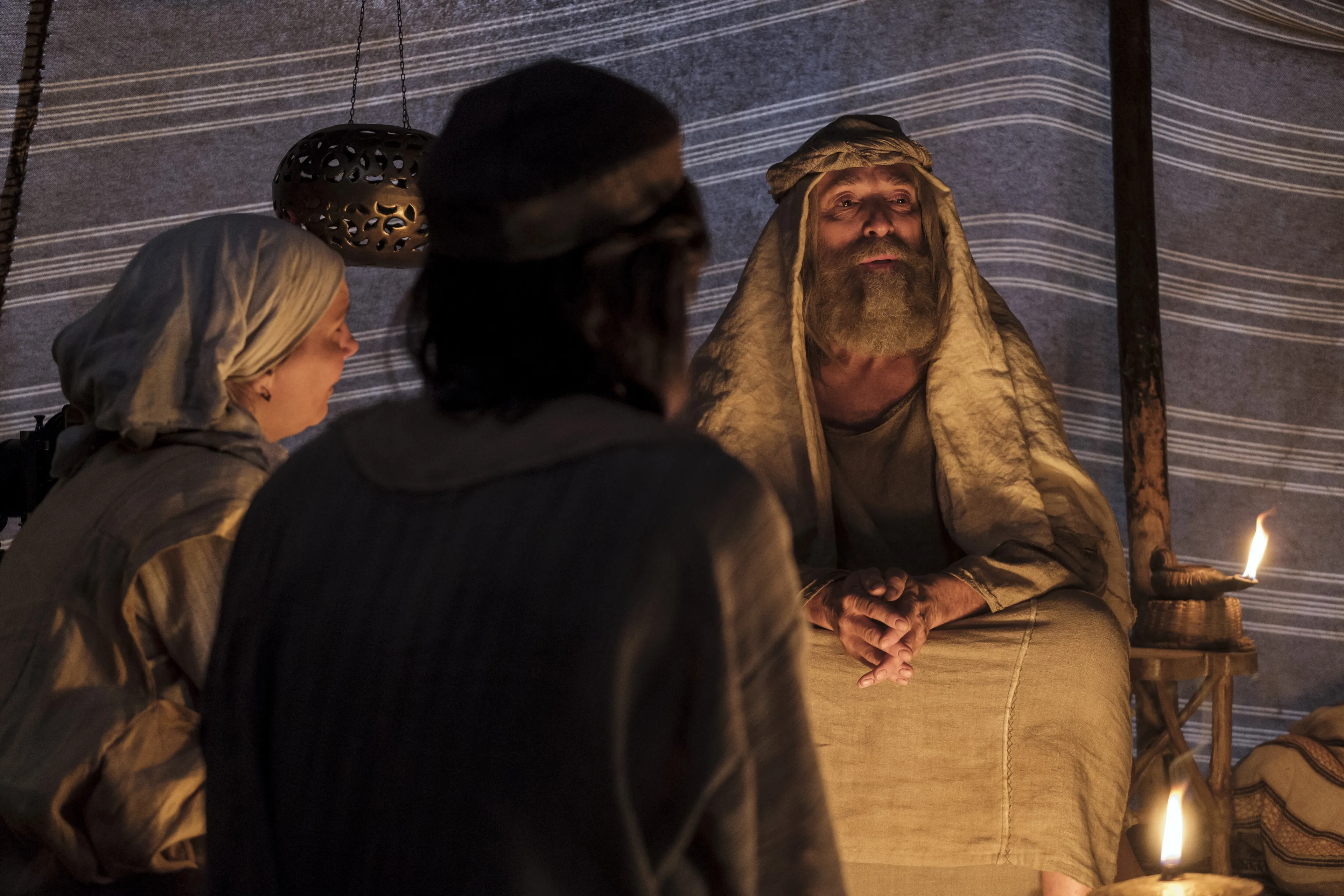 Lehi tells his family about his vision of the tree of life.