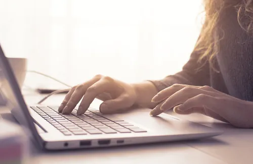 woman using laptop computer