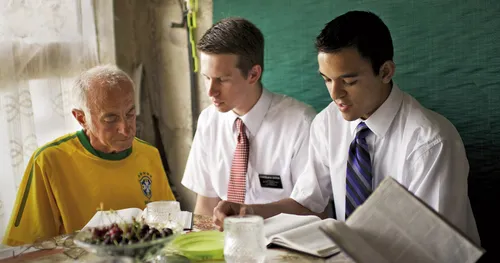 missionaries teaching man