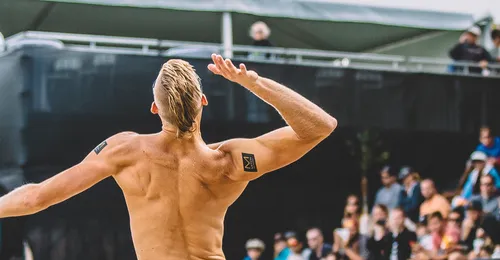 Casey playing beach volleyball