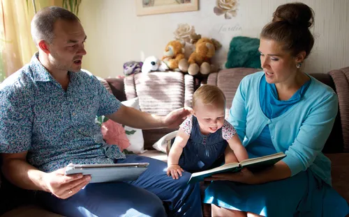 parents reading to child