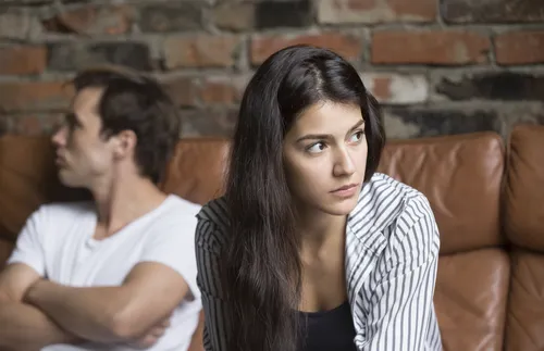 Couple looking away from each other