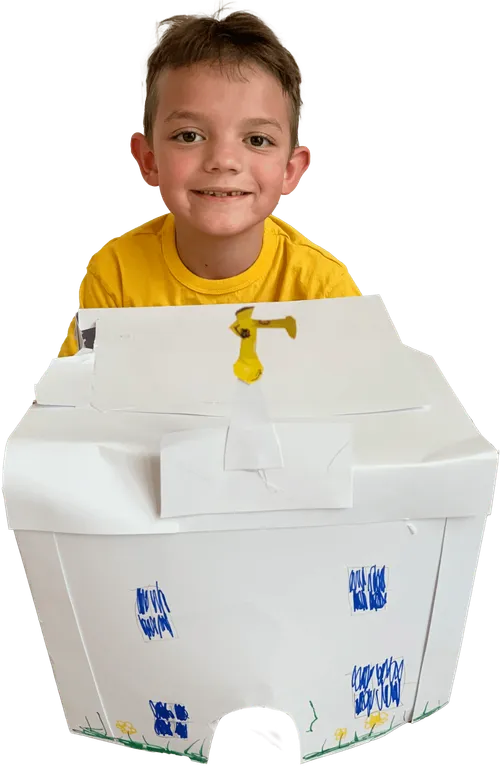 Photo of a boy named Jones Francom with his crafted temple.