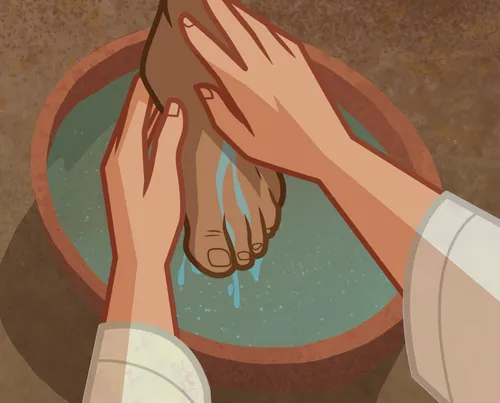 Jesus washing the foot of one of His Apostles.