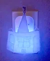 Temple-shaped night light made out of paper