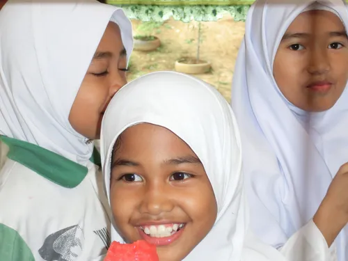 LDS Charities donated the frames and the Rotary Club of Kinabalu Sutera donated the lenses. The glasses were distributed to 1,300 primary and secondary students. Here are some of the students smiling.