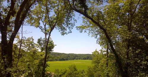 Landscape of Adam-Ondi-Ahman shows lush landscape and farmland.