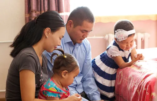 family praying