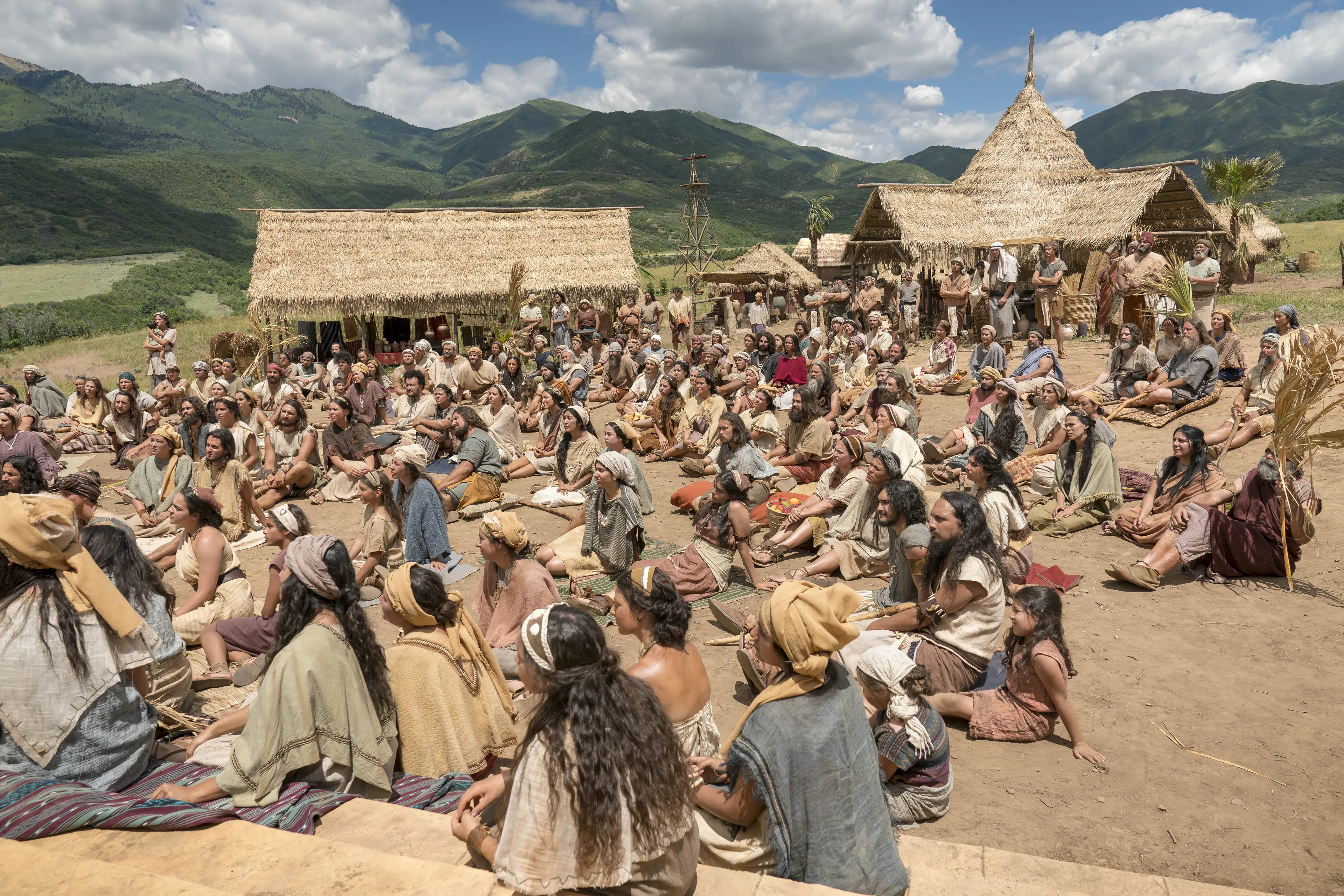 Jacob looks at the Nephites. He is by the temple.