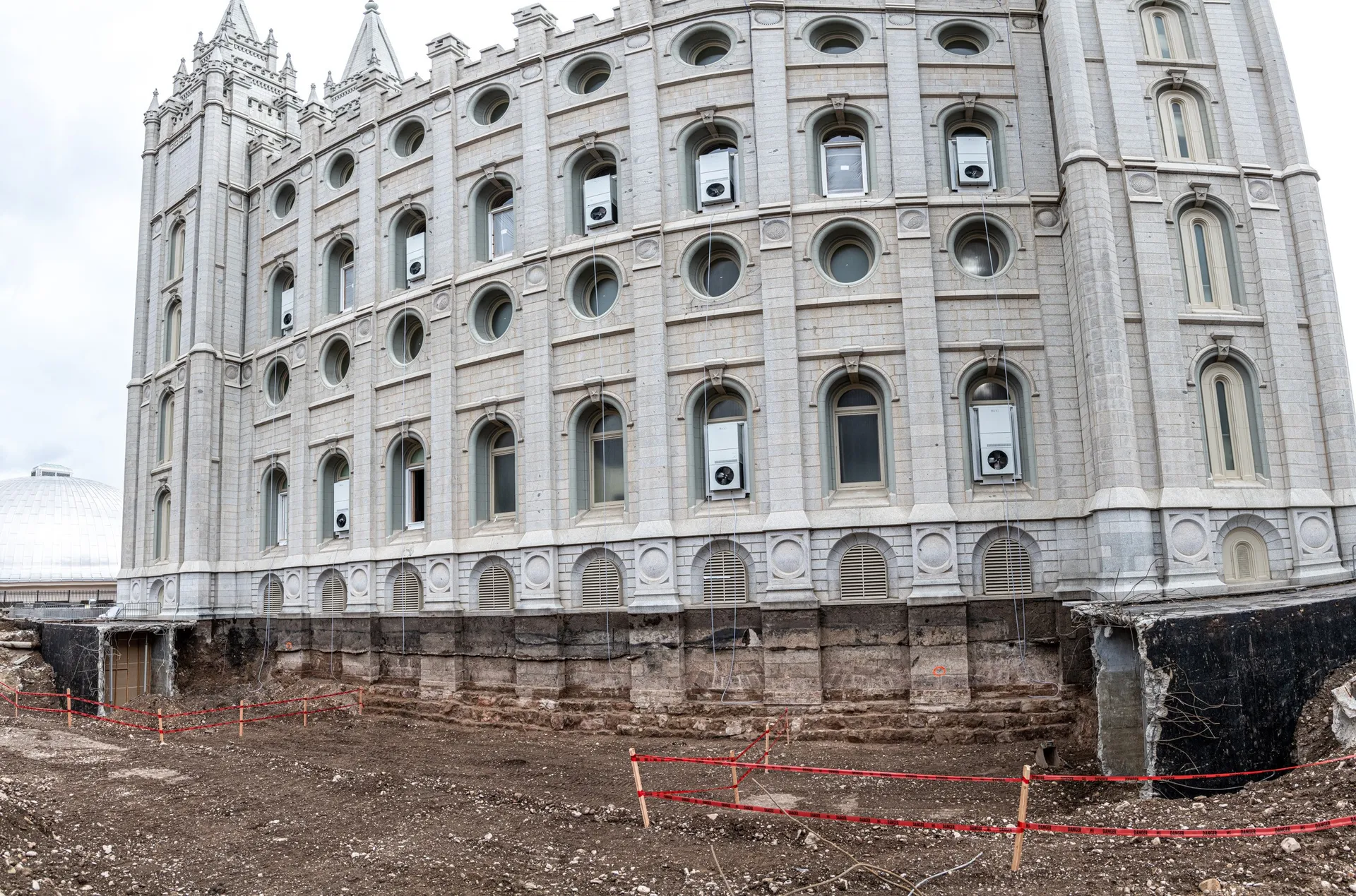 Images of the renovation during the Salt Lake Utah Temple renovation project. The images show some of the exterior damage from the earthquakes. 