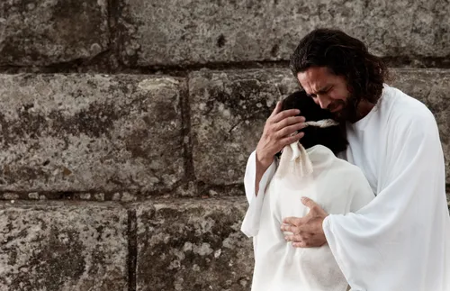 Christ weeping and comforting someone