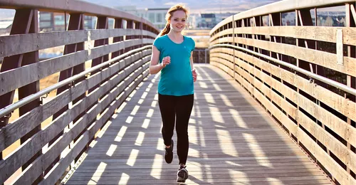 young woman running