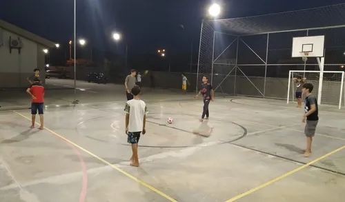 youth playing soccer outside