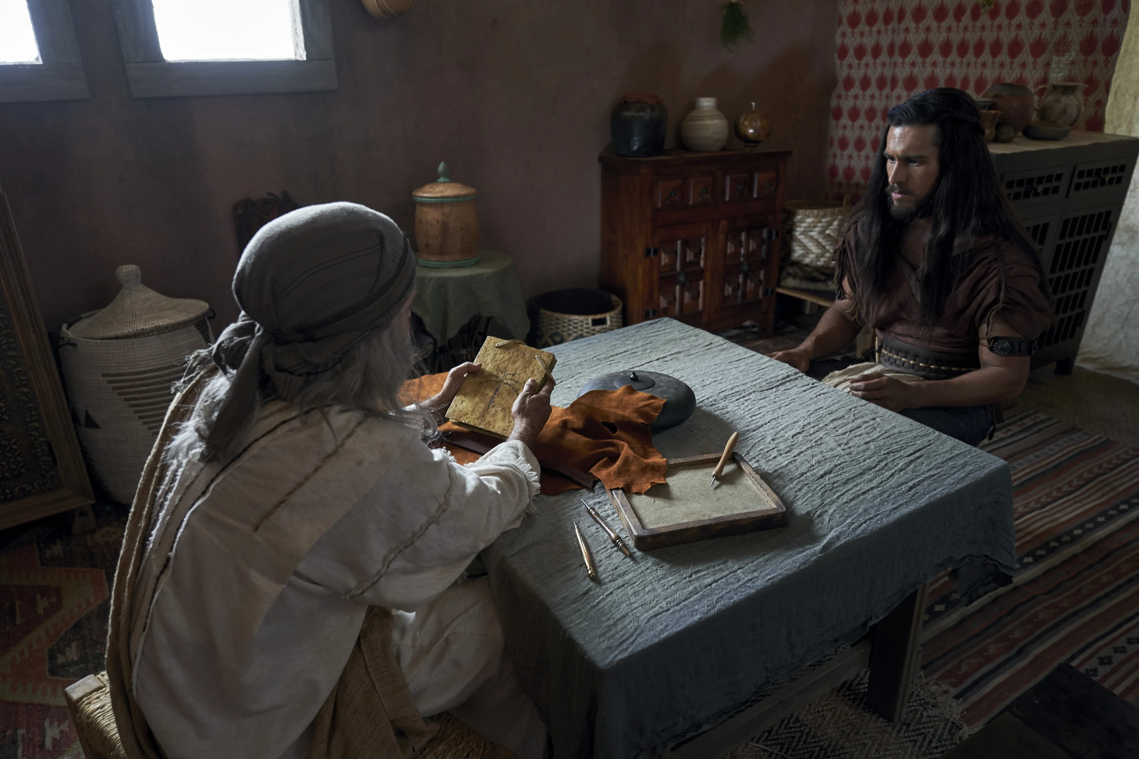 Jacob and Enos discuss the records.