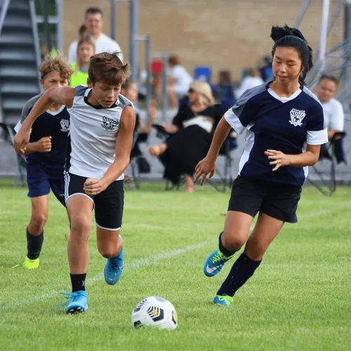 youth playing soccer