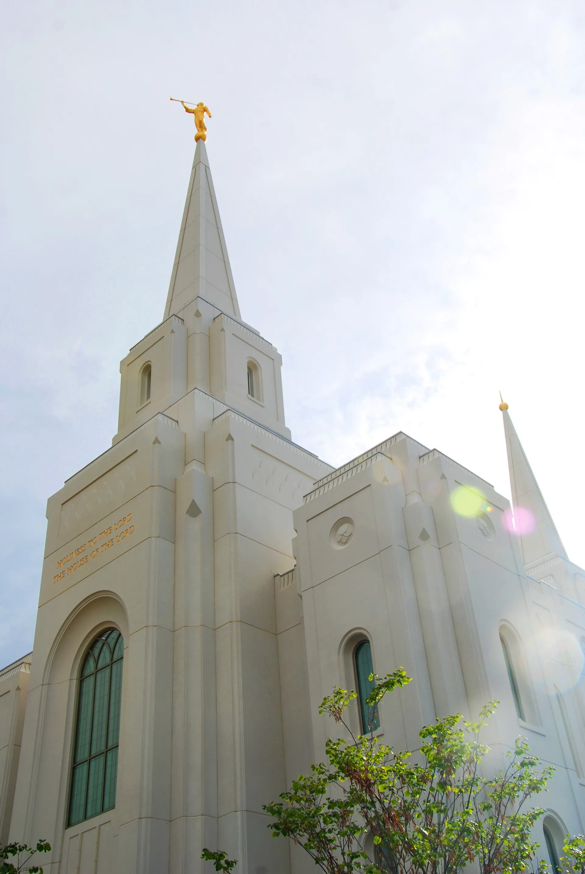 The Brigham City Utah Temple spires in sunlight, including the exterior of the temple.
