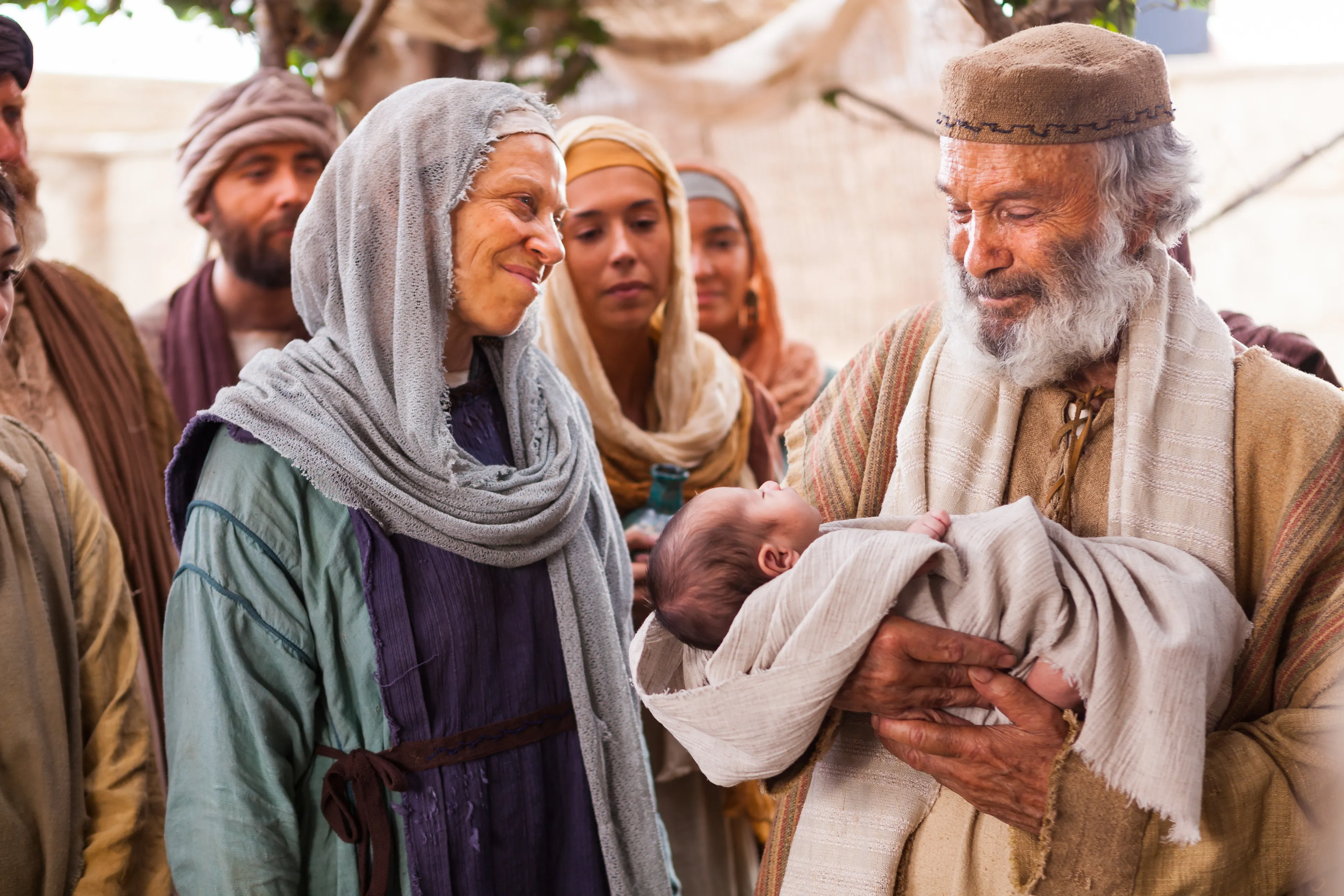 Un retrato de Elisabet y Zacarías con el bebé, Juan.
