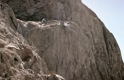 Rappelling down a cliff