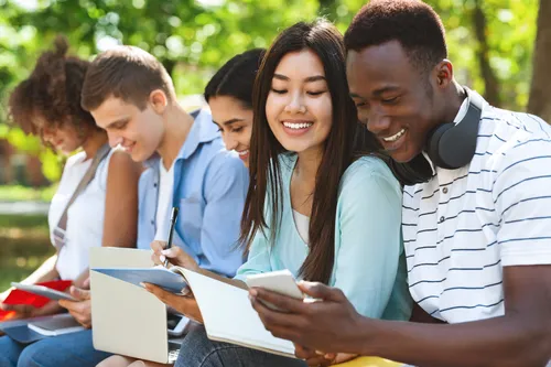 university friends preparing for lessons outdoors