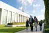 family walking by temple