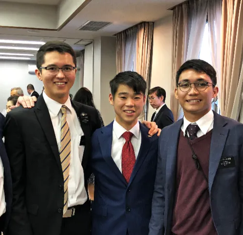 young man with missionaries