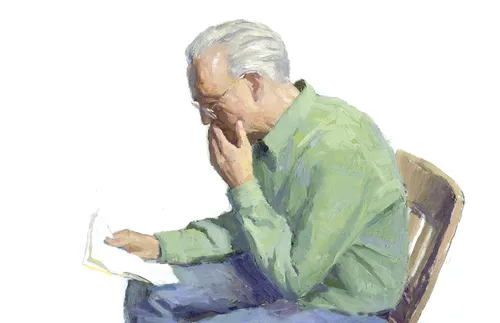 man reading a letter