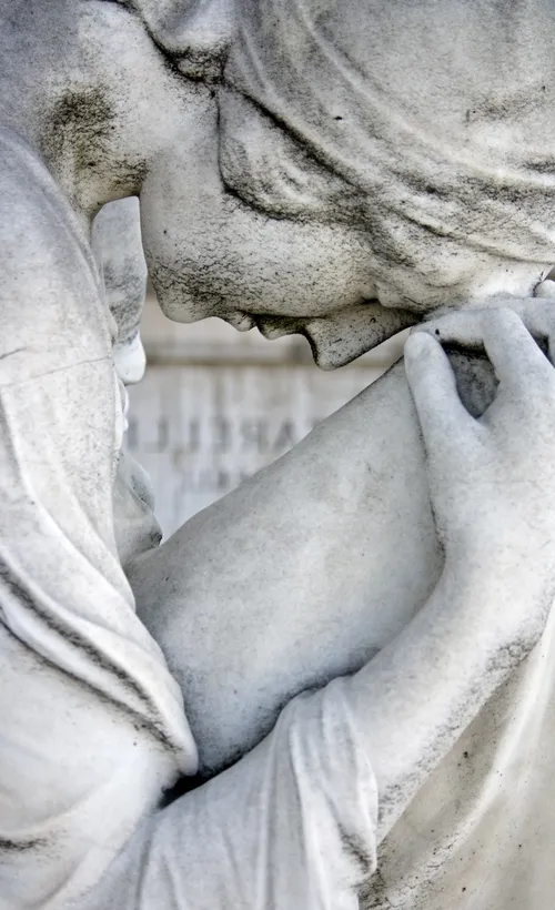 statue with head bowed