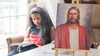 a girl reading scriptures in a chair and a picture of Jesus