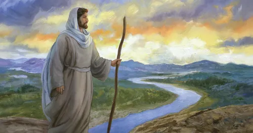 Jesus Christ is standing on a hill over looking a river