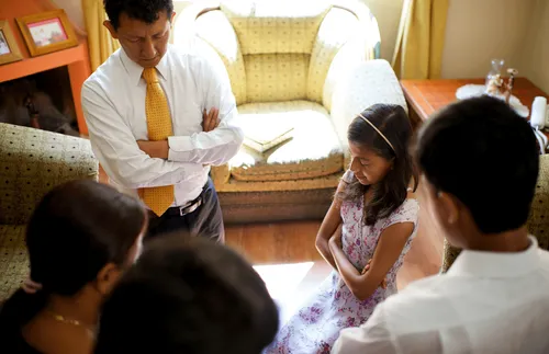 family praying