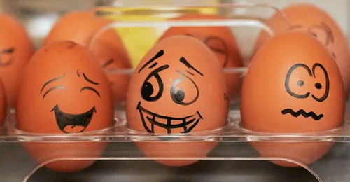eggs with faces drawn on them