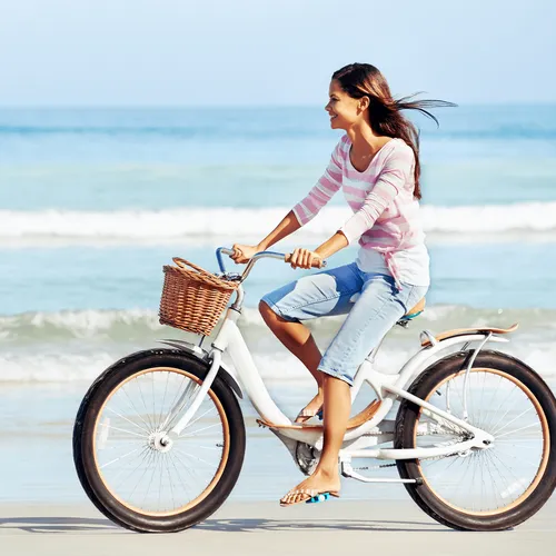 young woman riding a bicycle