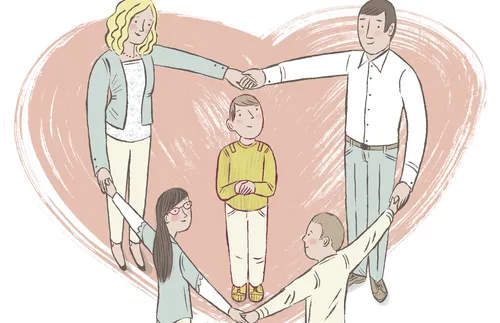 family encircling a boy