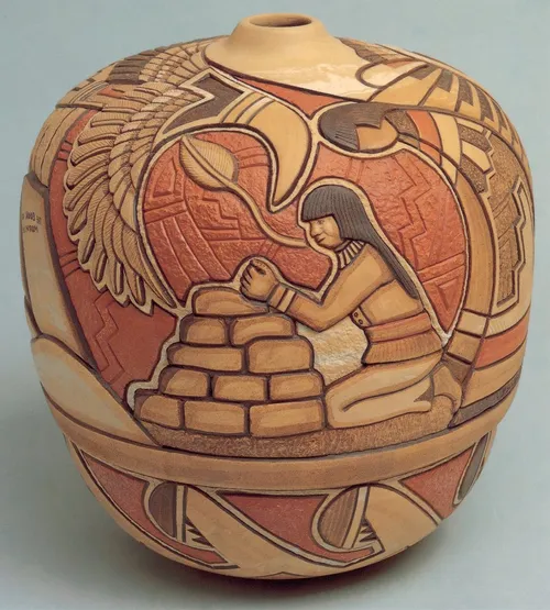 decorated pottery depicting a man praying