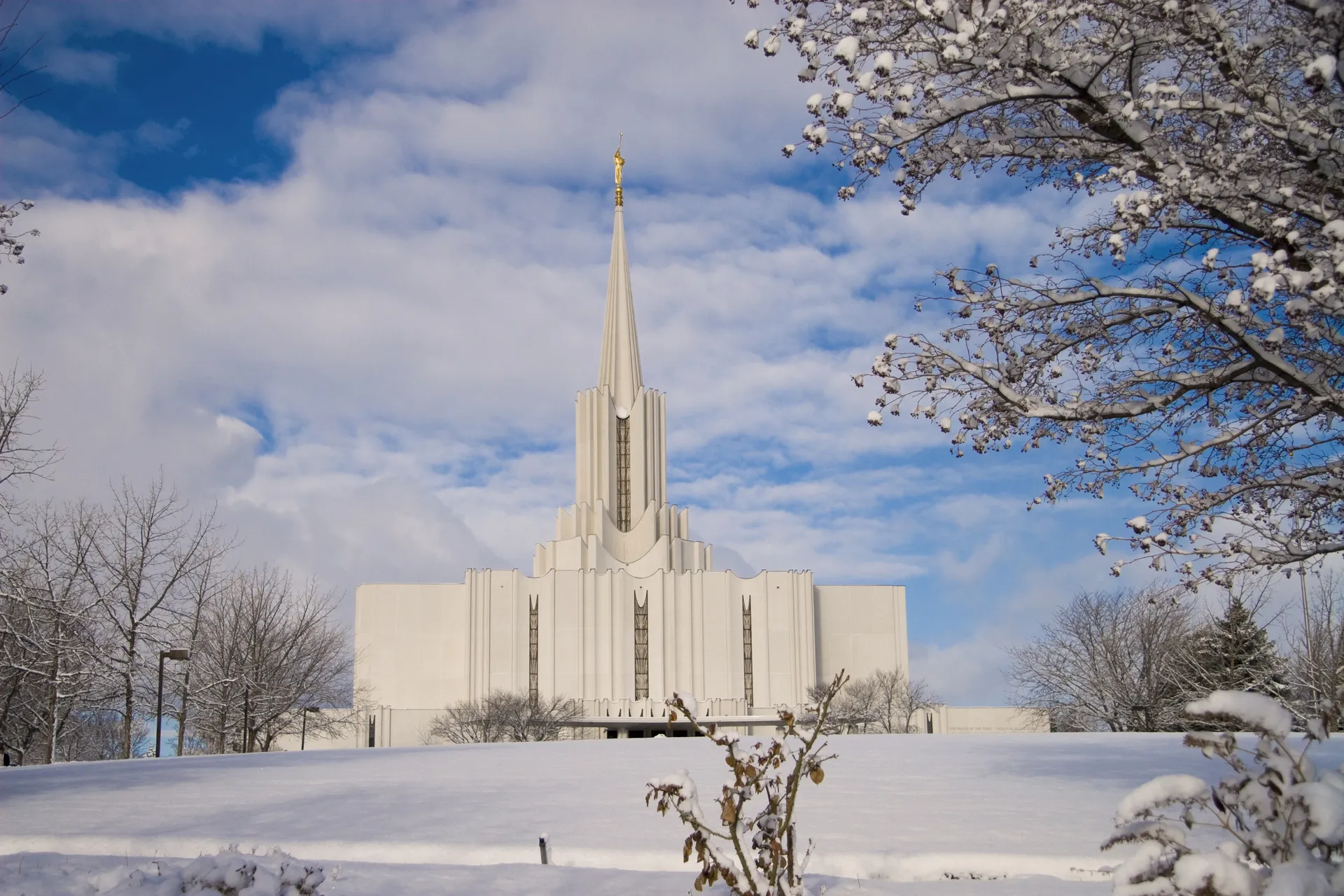 The exterior of the Jordan River Utah Temple in the winter.