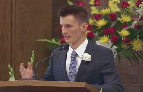 Zane Openshaw speaking at funeral