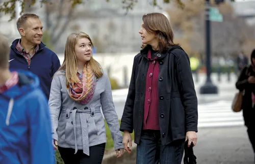 young woman with parents