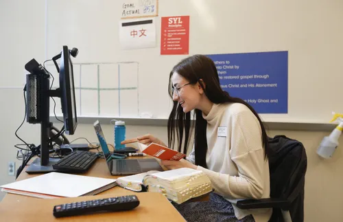 Woman sitting at a computer