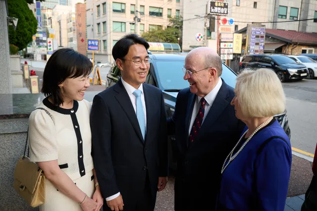 Elder Cook Engages Supreme Court Justice and Journalist in South Korea