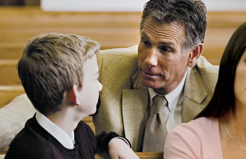 man talking with young man