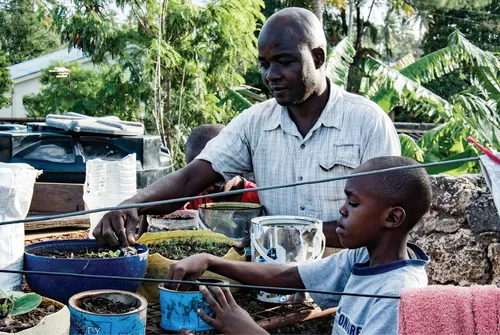 father and son gardening