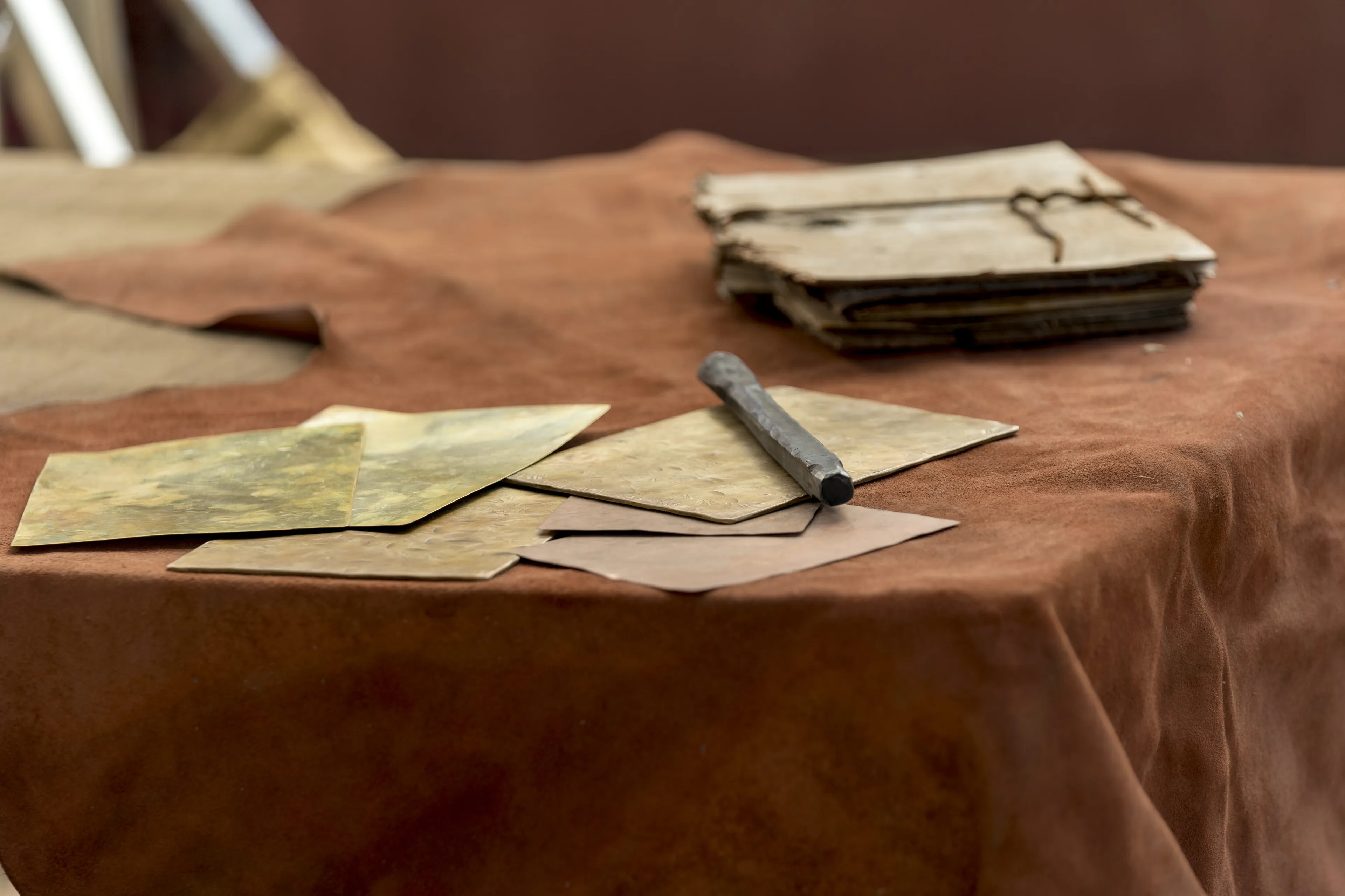 Metal plates sit on a table.