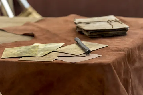 Metal plates sit on a table.